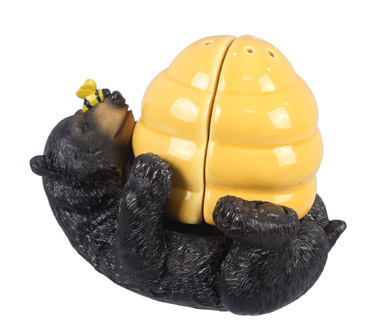 Ceramic bee hive salt and pepper shaker with resin bear holder